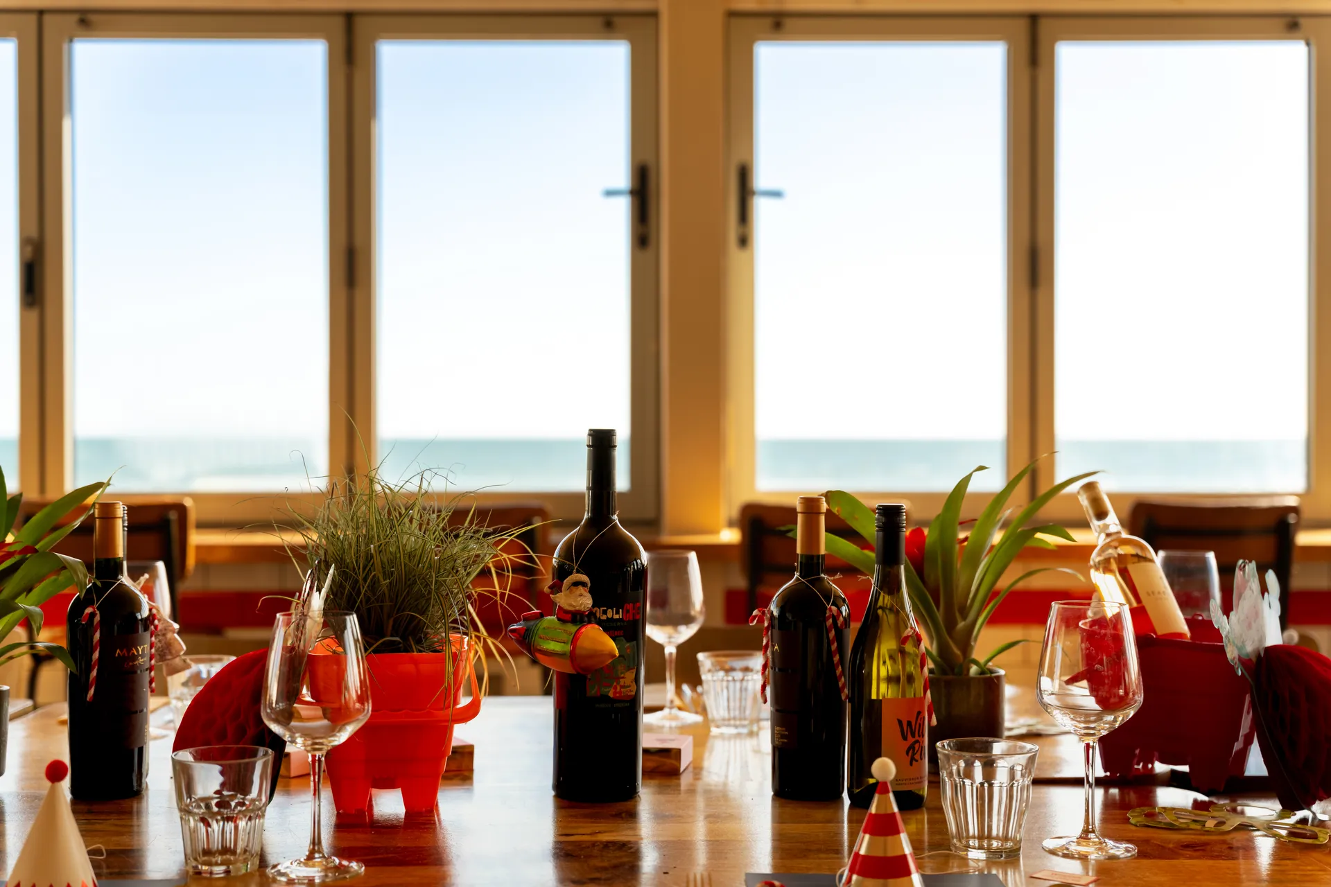 Private dining table at Alum Beach Hut overlooking the sea
